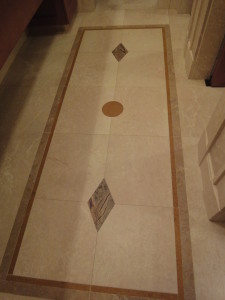 Talisen Construction Corporation: Construction Management and General Contractor. University Club, 1 West 54th Street, New York. Close-up of custom stone flooring with diamond and oval shapes