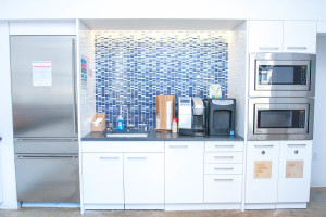 Talisen Construction Corporation: Construction Management and General Contracting. A&E Networks, 235 East 45th Street, New York. micro-kitchen with mixed blue backsplash and white cabinets