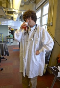 Man in Doctor Costume drinking Beer