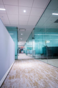 glass partitions down office hallways